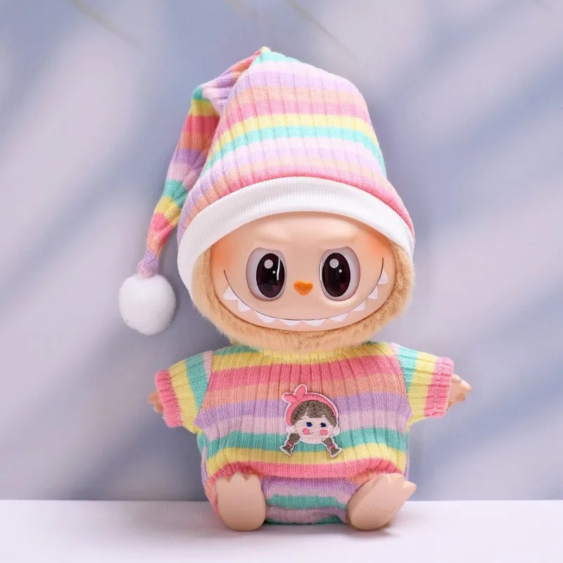 Labubu with a rainbow striped hat and sweater on a light background