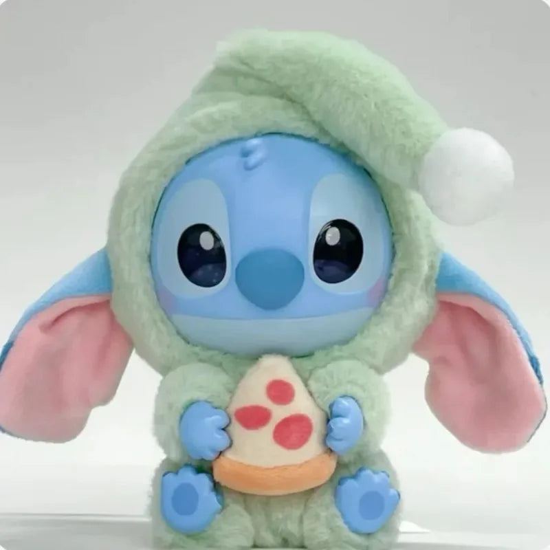 Plush toy resembling a character from a cartoon, holding a small object. Disney Stitch
