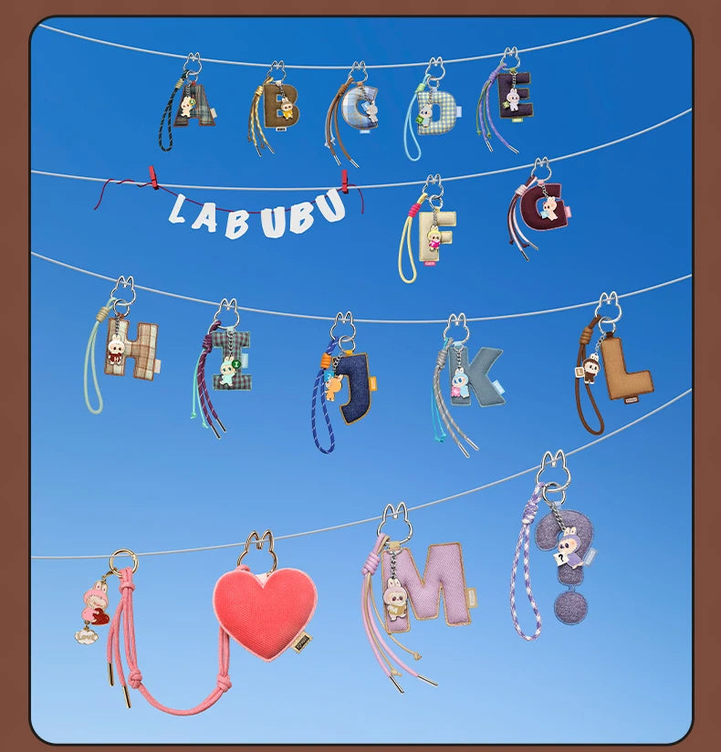 Labubu Pin for Love. Collection of colorful keychains with 'LABUBU' branding on a blue background