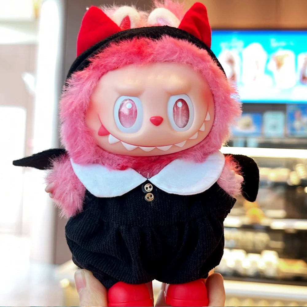 Labubu with pink fur, red accents, and black outfit in a store setting