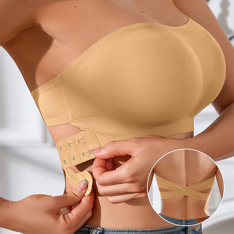 Beige strapless bra being adjusted on a person with an inset showing the back design.