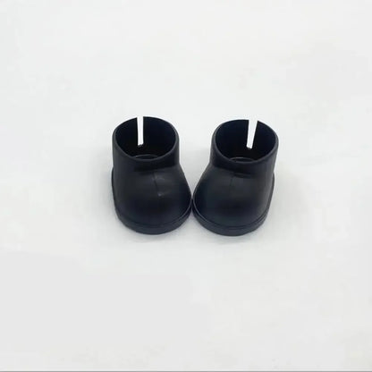 Labubu boots. Pair of black rubber boots on a white background