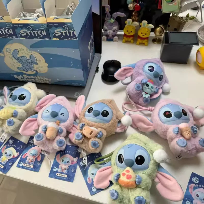 Plush toys resembling a character from Lilo and Stitch animated movie on a table with packaging in the background.