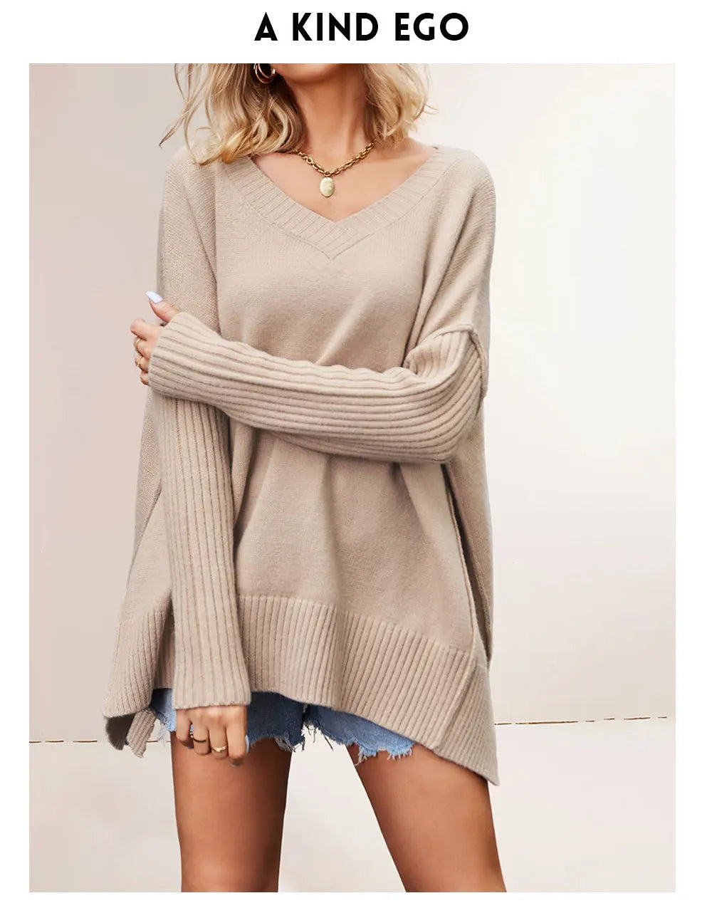 Woman wearing a beige sweater and denim shorts with 'A Kind Ego' branding.