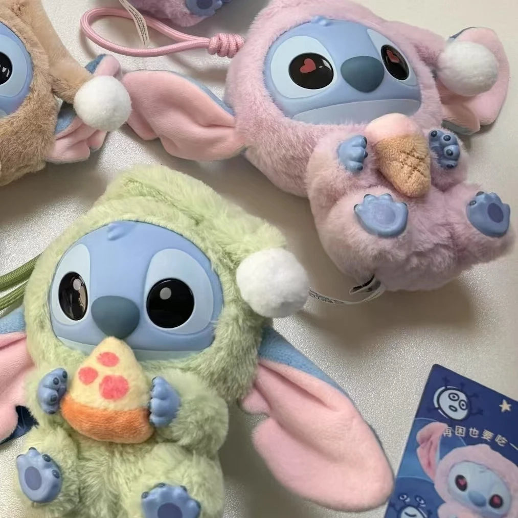 Lilo and Stitch Disney,Two plush toys resembling a character with large eyes and colorful fur on a light background.