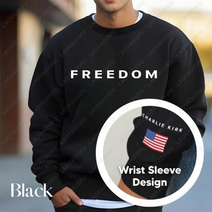 Black sweatshirt with 'FREEDOM' text and a close-up of a wrist sleeve design.