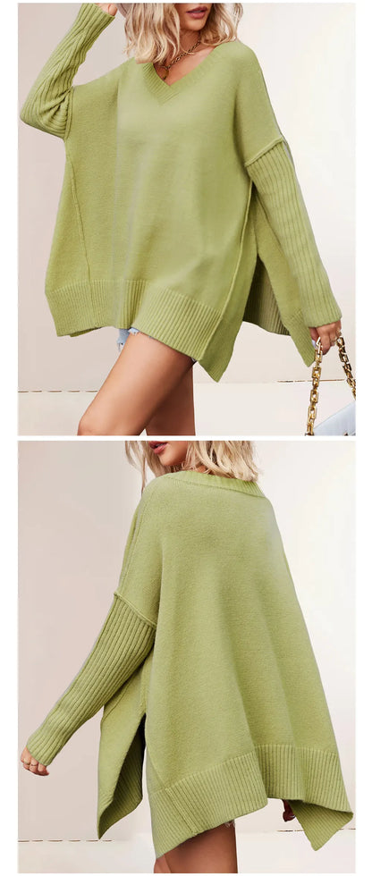 Green sweater worn by a person on a white background