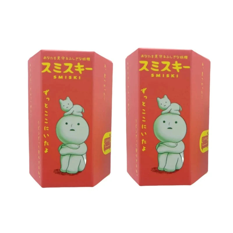 Two red boxes with a green cartoon character and 'SMISKI' branding on a white background.