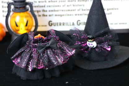 Labubu Halloween dress. Black glittery Halloween pet collar and witch hat with decorative elements on a dark background.