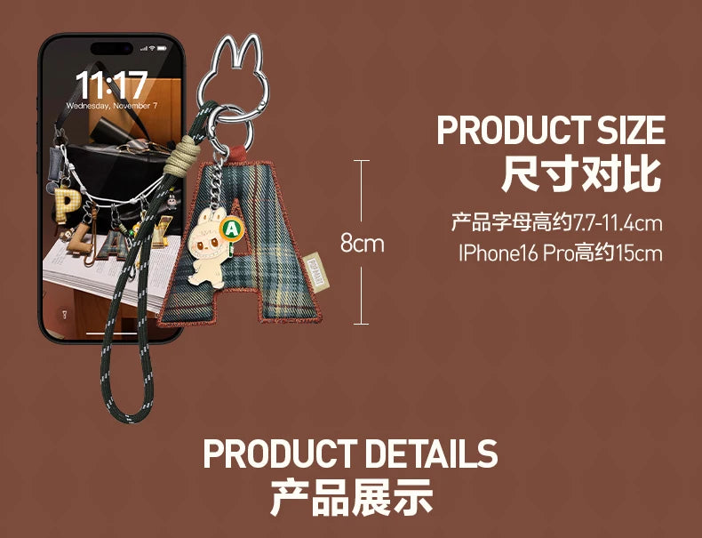 Labubu Pin for Love. Product size comparison with a smartphone and keychain on a brown background