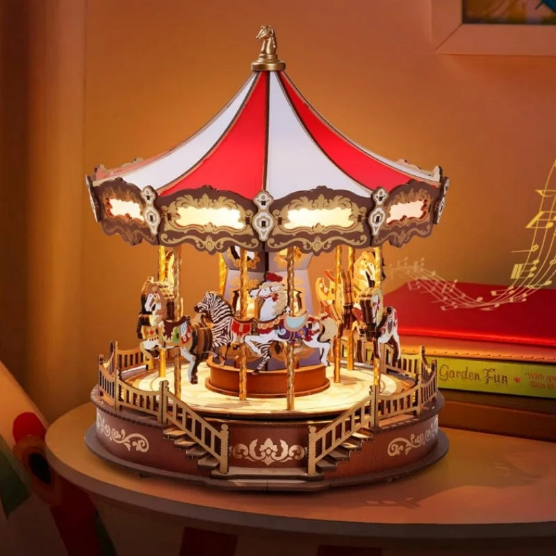 Decorative carousel model on a table with warm lighting