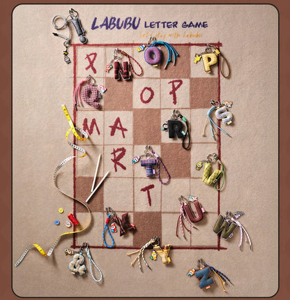 Labubu Pin for Love. Board game with letter-shaped charms on a checkered board