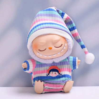 Labubu with colorful striped hat and sweater on a light background