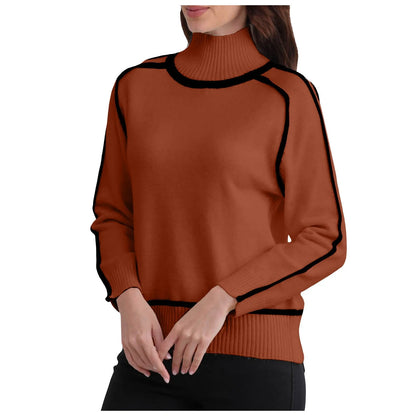 Brown sweater with black accents worn by a person on a white background