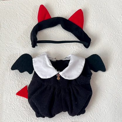 Labubu. Black cat-themed headband and romper set on a white background