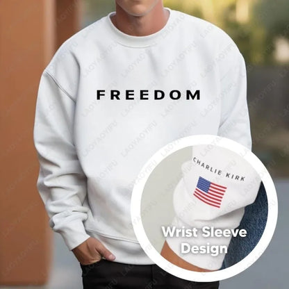 White sweatshirt with 'FREEDOM' text and a close-up of a wrist sleeve design.
