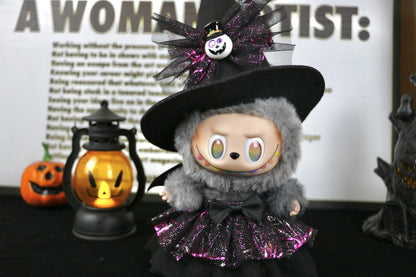 Labubu Halloween dress. Labubu Halloween dress. Halloween-themed plush toy with a witch outfit and pumpkin lantern in the background.