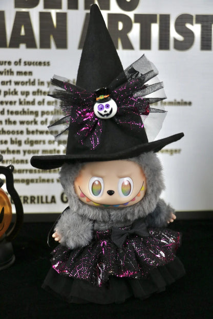 Labubu Halloween dress. Halloween-themed plush toy with witch costume and hat on a dark background